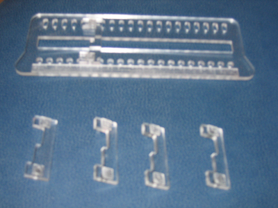 Photo de la règle créé par l'ERDV pour les déficients visuels